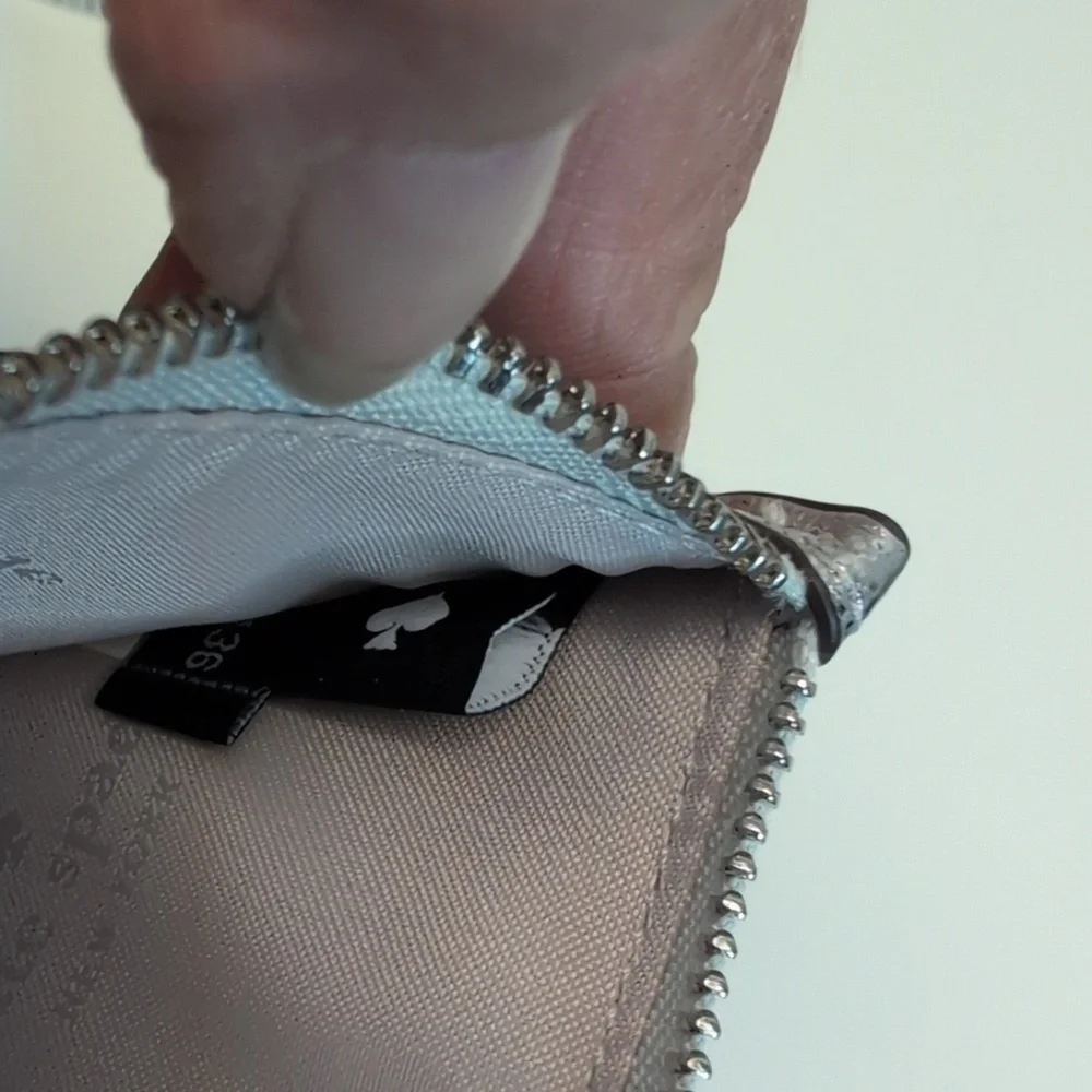 Kate Spade Lucy Small Silver Zip Around Wristlet Retail $99